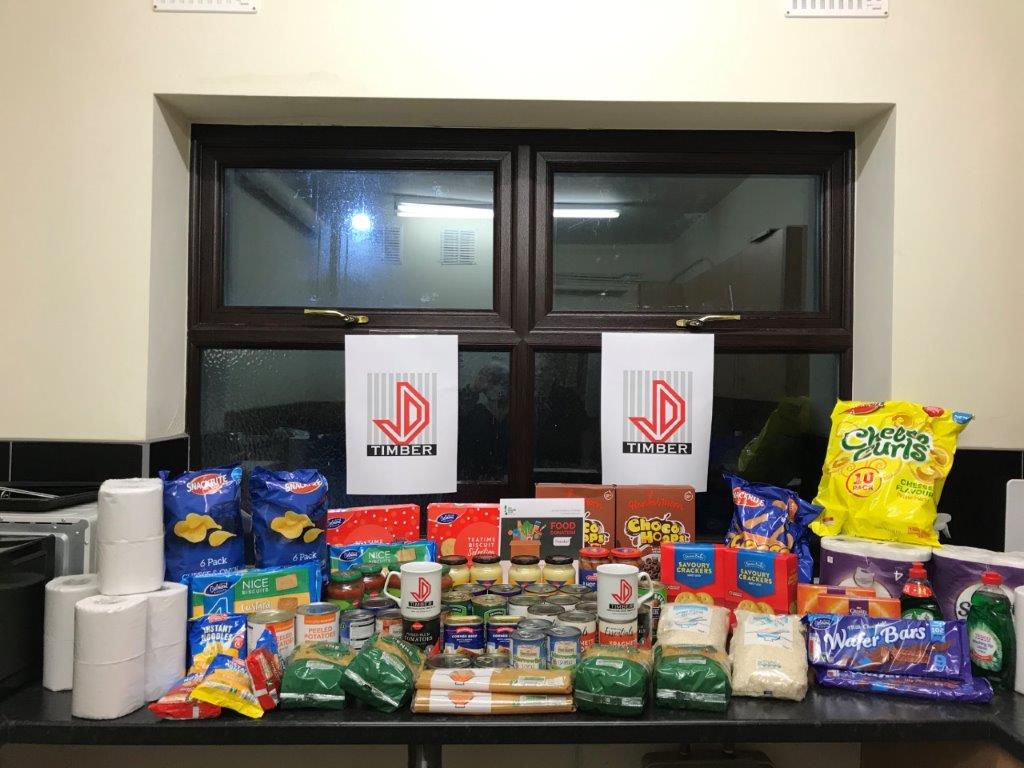 JDT Chorley staff donations to local food bank